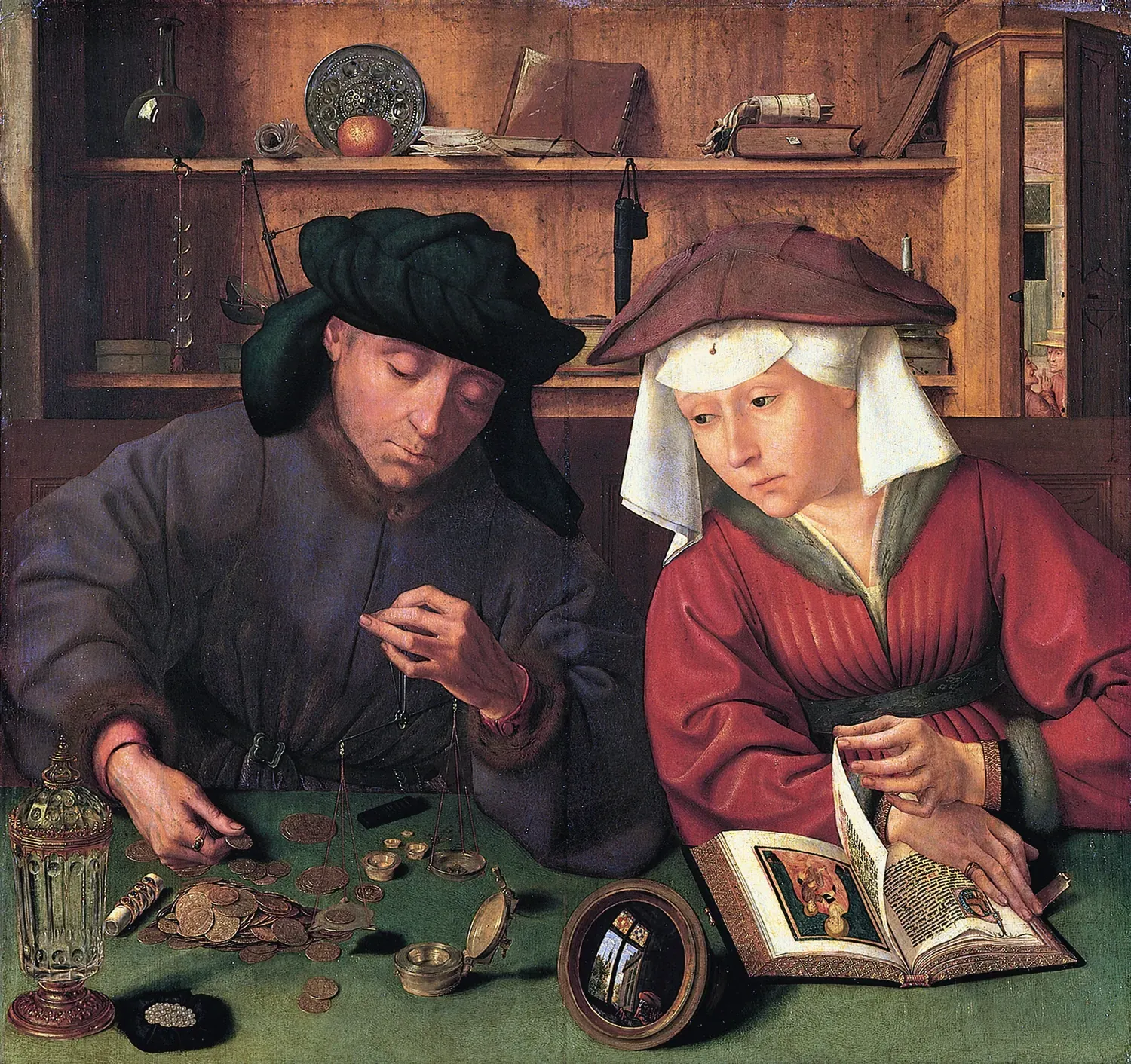 O prestamista e sua mulher, de Quentin Massys (1514): ele pesa moedas de ouro numa balança de mão enquanto ela folheia um livro.